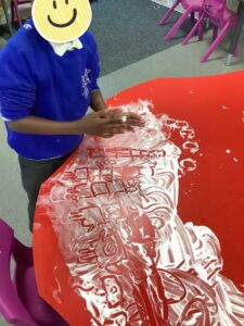 Drawing Numberblocks in shaving foam